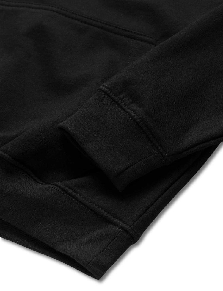 Detailed image showing the cuff of Alan Walker's Faded 2.0 black hoodie with clean stitching, against a white background.