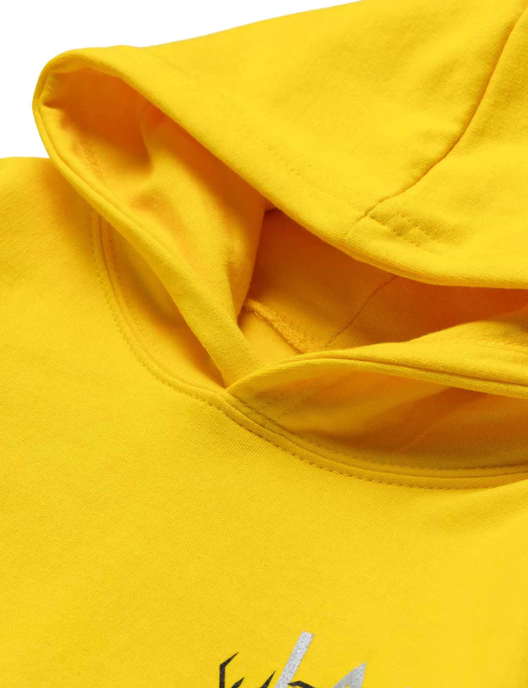 Close-up of the high-quality yellow fabric and hood stitching on Alan Walker kids' hoodie.