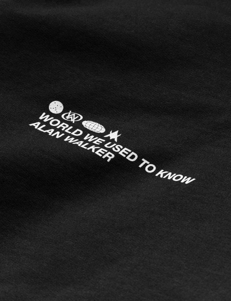 Close-up of the Alan Walker quote on the black 'World We Used To Know' hoodie.