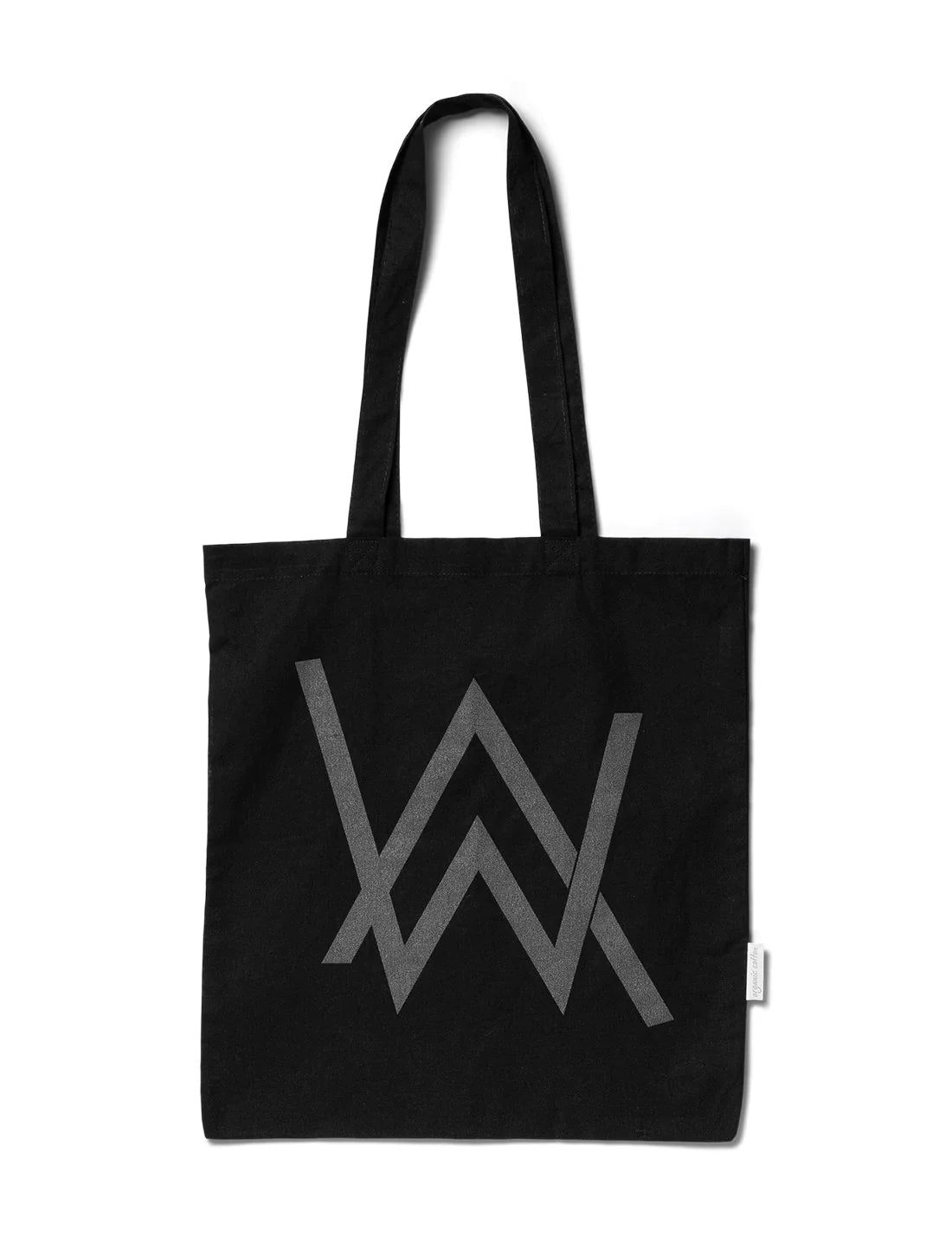 Durable black CORE REFLECTIVE TOTE BAG viewed from the back, displaying a subtle outline of the signature 'AW' logo, epitomizing minimalist design with a functional aesthetic, set against a white backdrop.