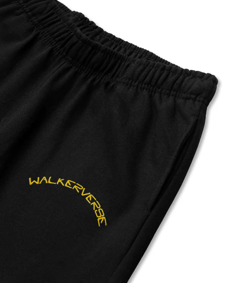 Detail of the elastic waistband on the black Walkerverse theme sweatpants.