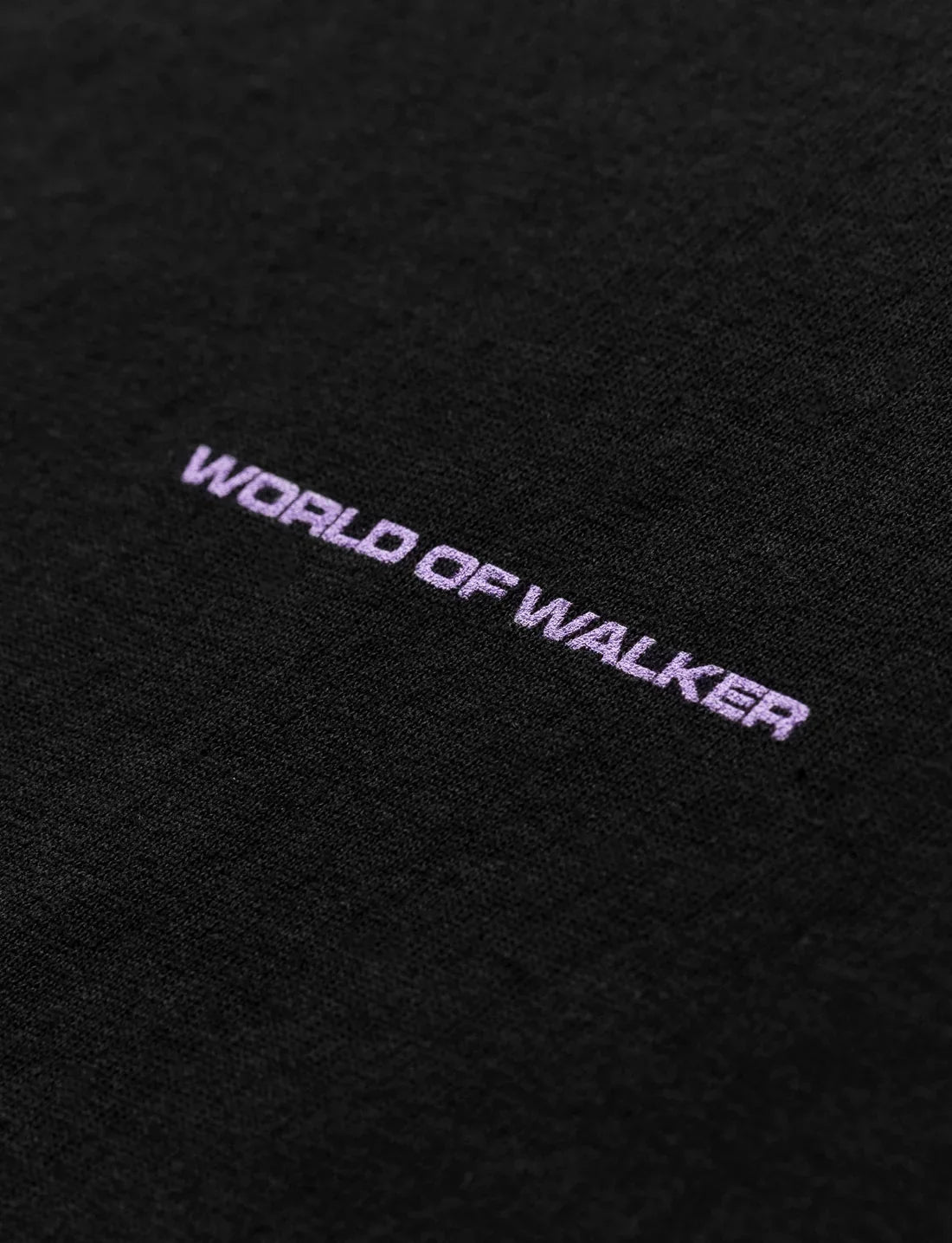 Detail shot showcasing the 'World of Walker' inscription in purple, part of the unique back design of the Melting Rose Hoodie.