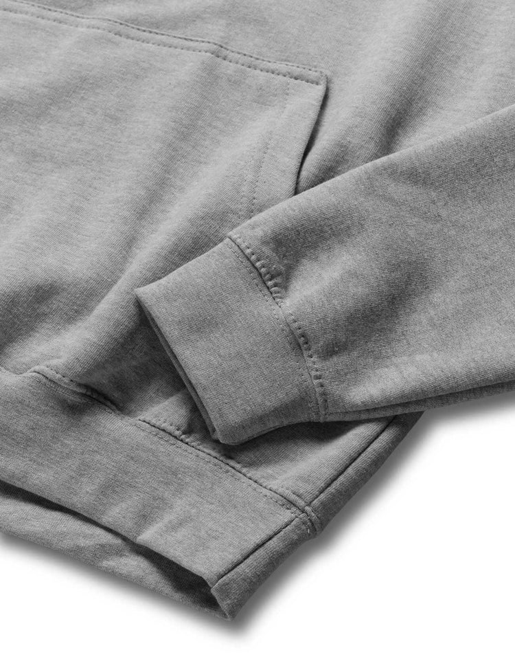 Zoomed-in view of the grey hoodie's ribbed sleeve cuff, showcasing the comfortable and snug fit.