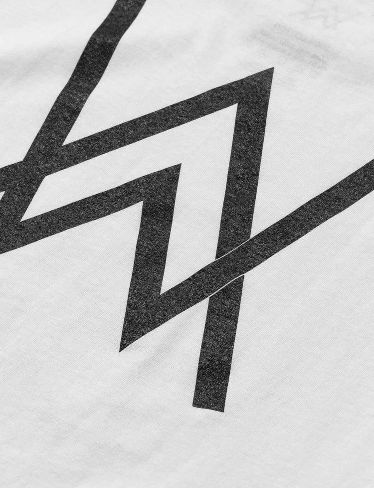 Close-up of the large Walker emblem on the back of a white graphic tee, part of the Alan Walker merchandise.