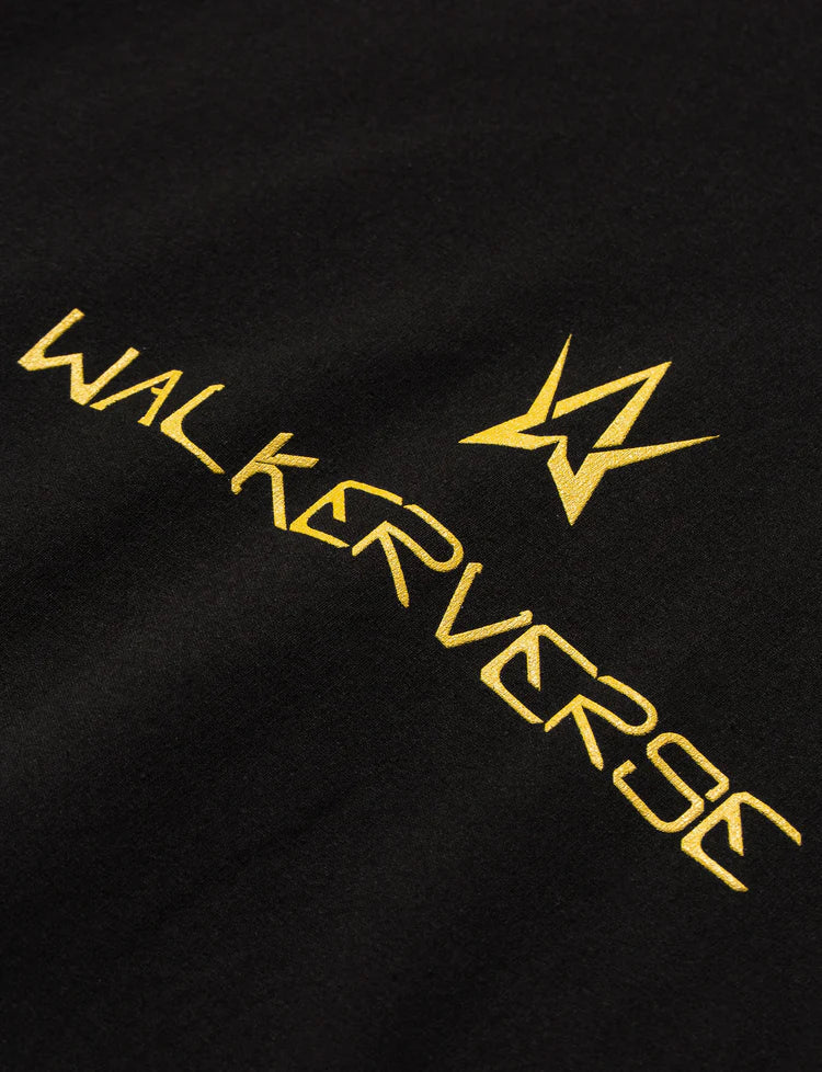 Close view of the Black Walkerverse 2.0 Hoodie's chest logo, stitched in a striking gold thread.
