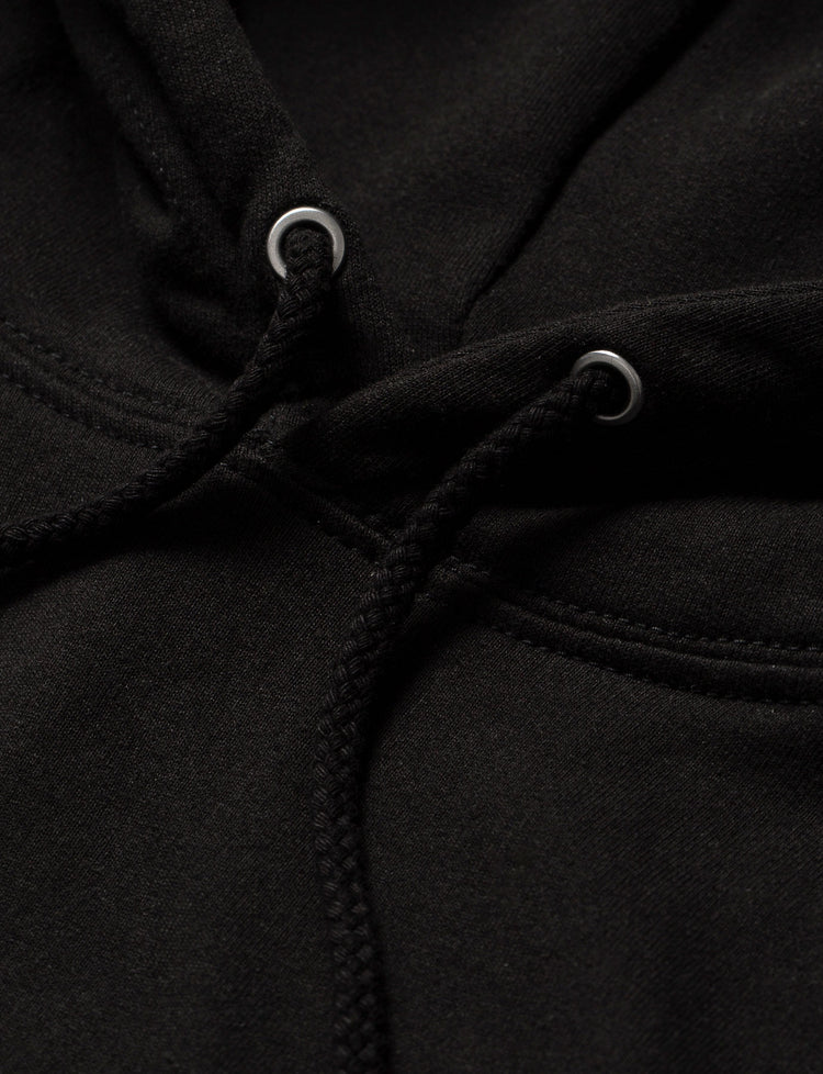 High-quality finish on the Black Walkerverse 2.0 Hoodie with durable drawstring eyelets for a comfortable fit.