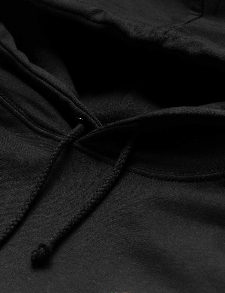 Close-up of the black drawstring and collar detail on the 'World We Used To Know' hoodie.