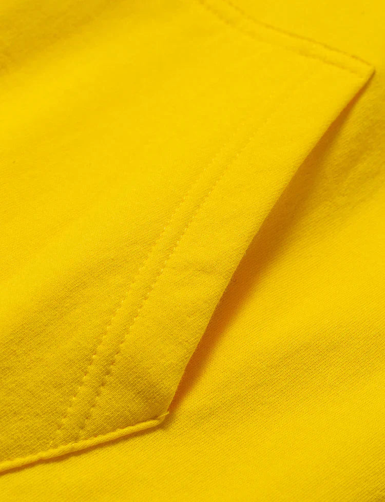 Detail of the ribbed cuff on the Yellow Walkerverse 2.0 Hoodie.